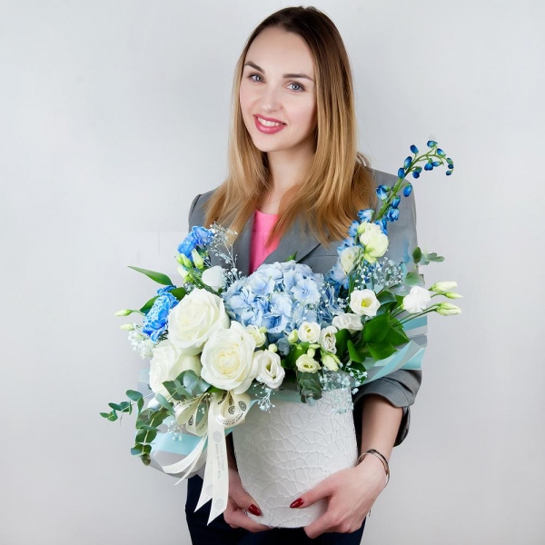 Blue/purple hydrangea - 2, Blue carnation - 4, White rose 50 cm - 4, lisianthus - 4, Colored gypsophila - 1, Round flower box small , Oasis, Wrapping Paper, Ruscus, Eucalyptus Cinerea, Blue Delphinium