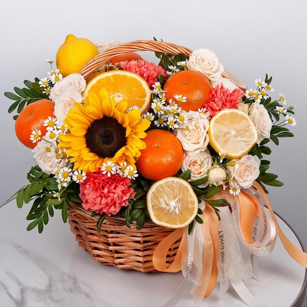 Peony sprayrose - 5, Sunflower - 1, Chamomile - 4, Pink carnation - 5, Small Basket, Oasis, Wrapping Paper, Pistachio, Orange, Tangerine, 1 pc., Lemon, 1 pc., Wooden skewer