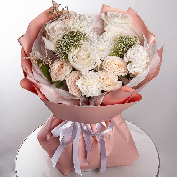 White rose 50 cm Ecuador - 7, Baltica White Spray Chrysanthemum - 1, Peony sprayrose - 2, Carnation white, cream - 5, Moluccella, Astilbe, Wrapping Paper