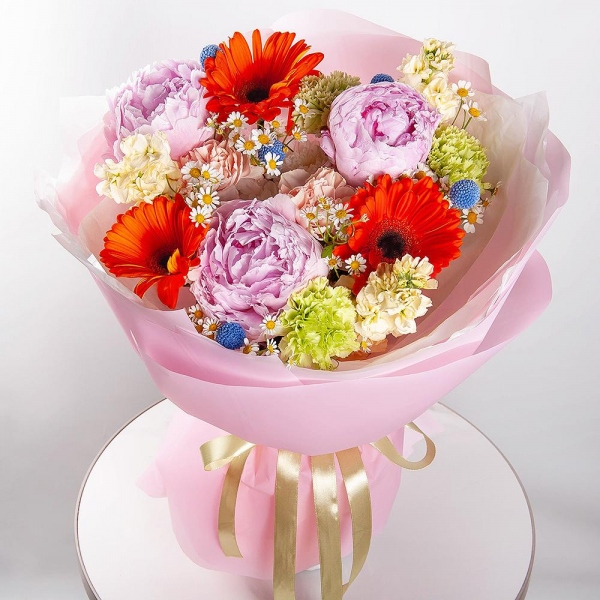 Gerbera daisies - 9, Peony pink - 3, Green carnation - 6, Baltica White Spray Chrysanthemum - 1, Chamomile - 2, White Matthiola - 3, Carnation white, cream - 5, Craspedia, Wrapping Paper