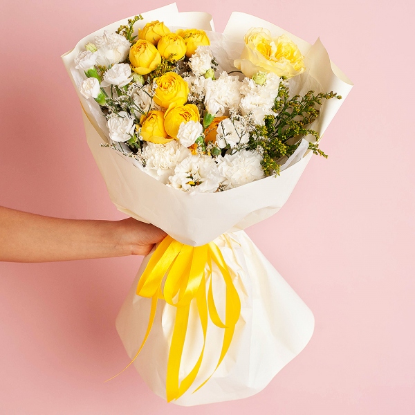Spray rose: yellow, orange 50 cm - 2, lisianthus - 3, Carnation white, cream - 5, White spray carnation - 5, Rose Yellow 50 cm Ecuador (Mohana, Latina, Brighton) - 1, Solidago (1 pc.), Limonium (1 pc.), Wrapping Paper