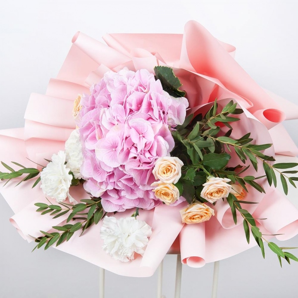 Pink Hydrangea - 3, Carnation white, cream - 5, Bright pink spray rose mix, 50 cm - 3, Eucalyptus parvifolia (1 pc.), Wrapping Paper