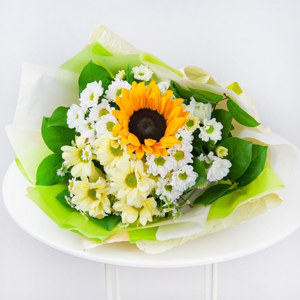Sunflower - 3, Bacardi Yellow Spray Chrysanthemum - 2, Santini White Spray Chrysanthemum - 3, Chamomile - 2, Salal, Wrapping Paper, Ribbon