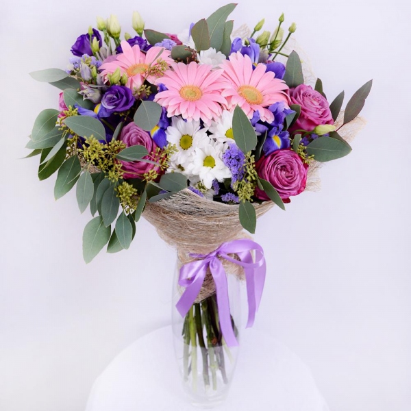 Moody Blue Rose - 11, Bacardi White Spray Chrysanthemum - 5, Purple Lisianthus (Eustoma) - 5, Gerbera pink - 5, Irises - 7, Blue Statice, Mesh (Abaka), Ribbon, Eucalyptus populus (1 pc.)