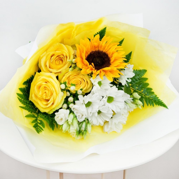 Yellow rose 50 cm - 5, lisianthus - 2, Bacardi White Spray Chrysanthemum - 2, Sunflower - 1, Fern (1 pc.), Hypericum, Wrapping Paper, Ribbon