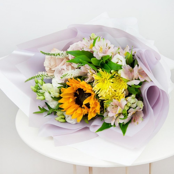 Alstromeria white, soft pink - 3, Baltica Yellow Spray Chrysanthemum - 2, lisianthus - 3, Rose Powder 50 cm Ecuador (Quicksand, Menta) - 4, Sunflower - 1, Veronica spray, Pistachio, Ribbon, Wrapping Paper
