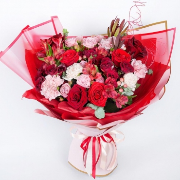 Carnations - 7, Spray rose 50 cm (multiple small blooms on a stem) - 7, Red rose 50 cm - 7, Alstromeria Red, Bright Pink - 4, Leukodendron, Hypericum, Eucalyptus Cinerea, Dried flowers in assortment, Wrapping Paper, Ribbon