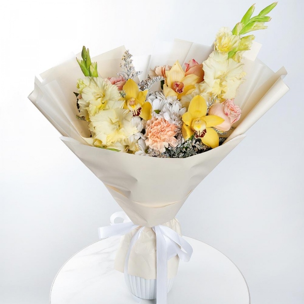 Bacardi White Spray Chrysanthemum - 3, White Gladiolus - 2, Orchid bud yellow/brown Cymbidium - 3, Carnation white, cream - 6, Pink rose 50 cm - 5, Flask for orchids, Solidago (1 pc.), Wrapping Paper