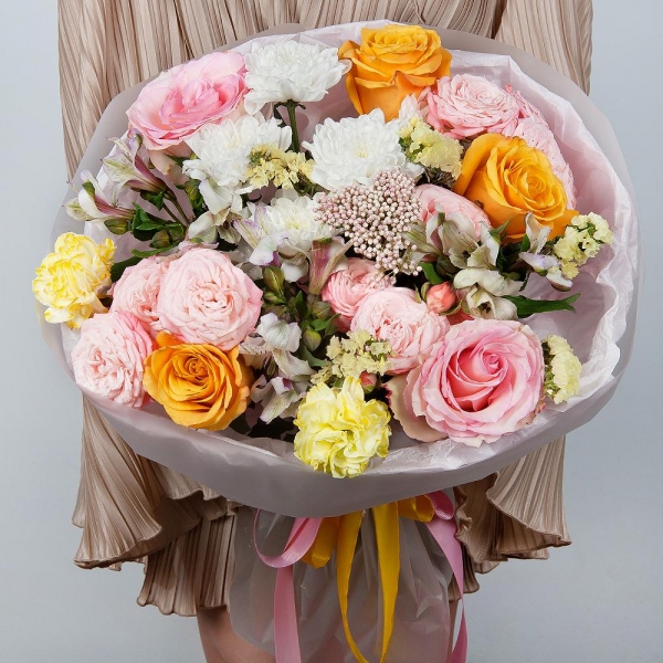 Yellow rose 50 cm - 5, Pink rose 50 cm - 3, Baltica White Spray Chrysanthemum - 2, Peony sprayrose - 3, Alstromeria white, soft pink - 5, Yellow carnation - 4, Yellow Statice, Ozotamnus, Wrapping Paper