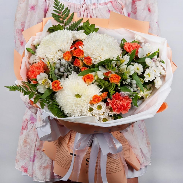 Magnum White Chrysanthemum - 3, Santini White Spray Chrysanthemum - 4, Spray rose: yellow, orange 50 cm - 3, Orange carnation - 7, White spray carnation - 7, Alstromeria white, soft pink - 7, Fern (1 pc.), Pistachio, Brunia Green Lanuginosa (1 pc.), Veronica spray, Wrapping Paper
