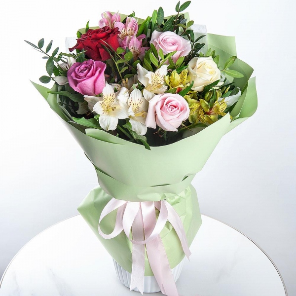 Red rose 50 cm - 1, White rose 50 cm - 1, Pink rose 50 cm - 3, Alstromeria white, soft pink - 3, Alstromeria Yellow, Orange - 2, Pistachio, Wrapping Paper
