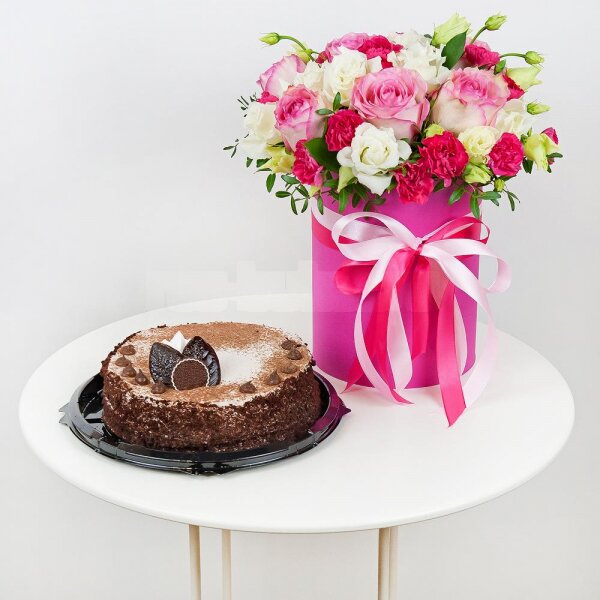 Pink rose 50 cm - 7, lisianthus - 3, Pink spray carnation - 3, Round flower box small , Oasis, Film, Pistachio, Ruscus, Ribbon, Cake in assortment